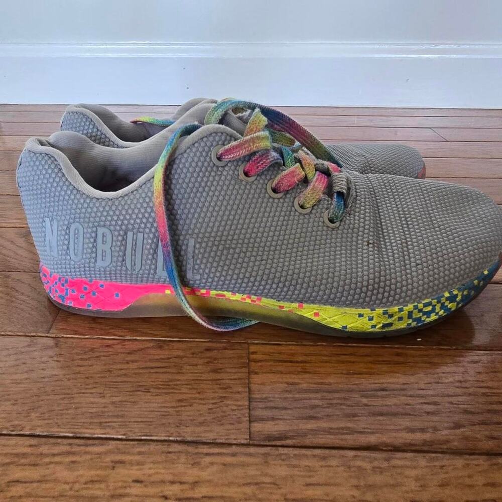 Nobull gray sneakers with pink, yellow, and blue accents US 8